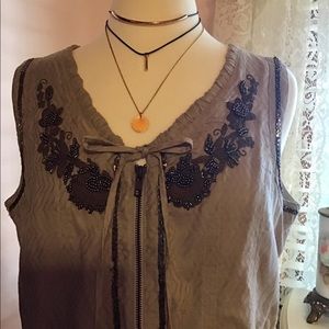 Beautiful tan vest with two drawstrings